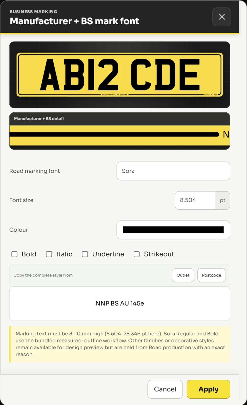 The manufacturer and British Standard mark font dialog, showing a live preview of the marking on a plate above font, size, colour and style controls.